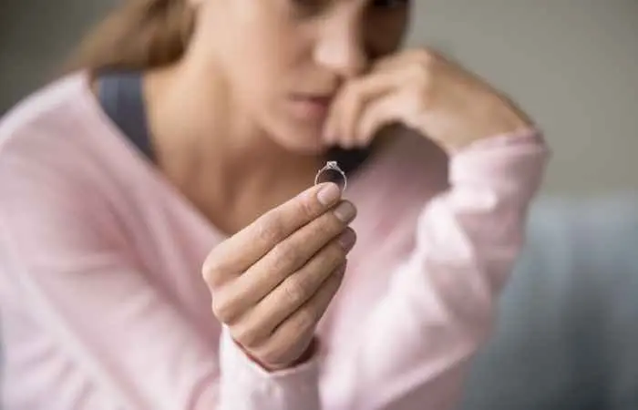 A young woman sad and anxious after her divorce