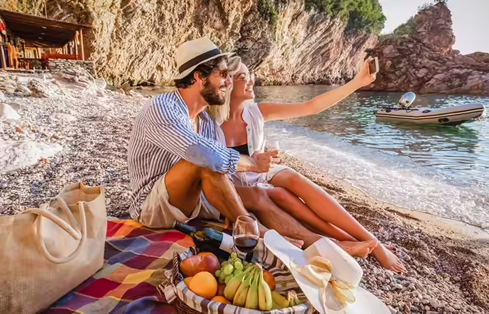 A relaxed couple on the beach for an outdoor date A relaxed couple on the beach for an outdoor date