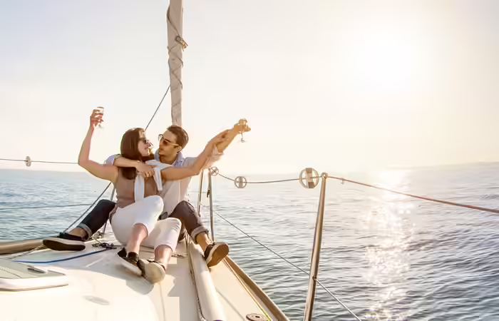 A young couple on a thrilling boat ride date A young couple on a thrilling boat ride date