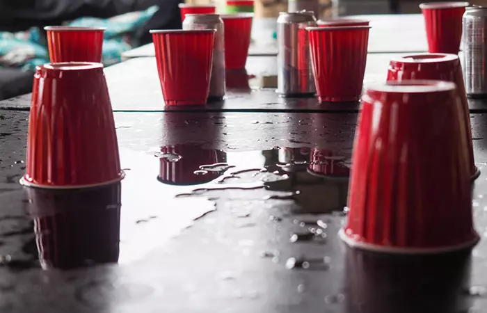 Flip cup game as a fun party game for couples