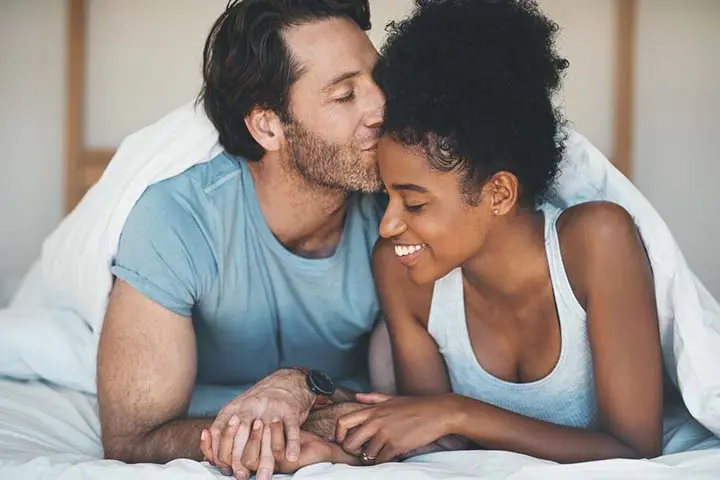 Happy couple in bed