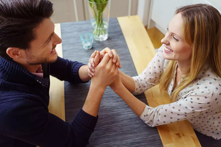 Holding his hand