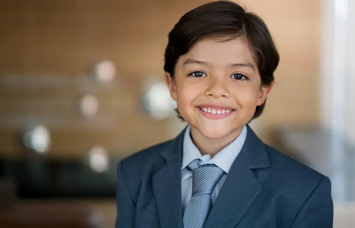 A little boy is the perfect ring bearer