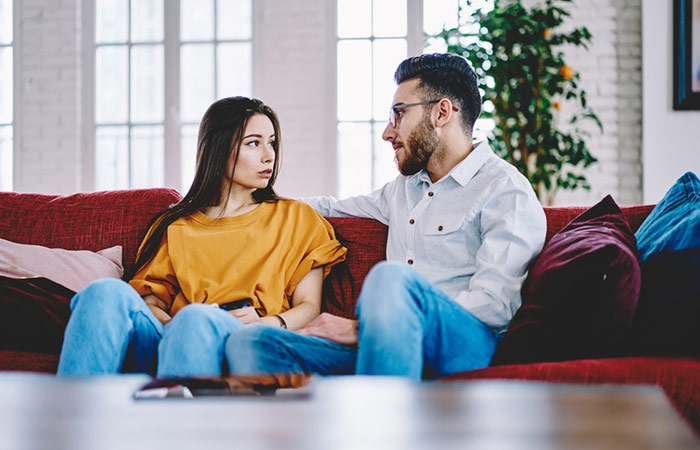 A man and woman resolving a conflict amicably