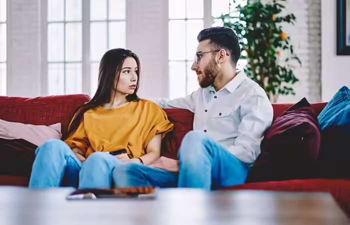 A man and woman resolving a conflict amicably A man and woman resolving a conflict amicably