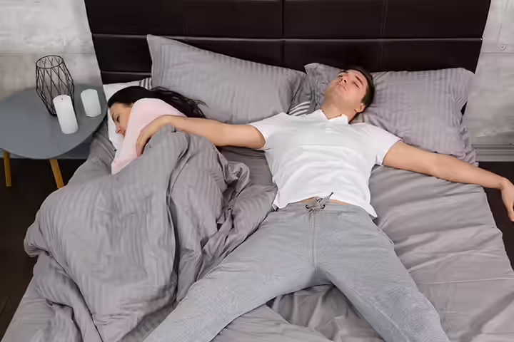 Superhero or space hog couple sleeping position Superhero or space hog couple sleeping position