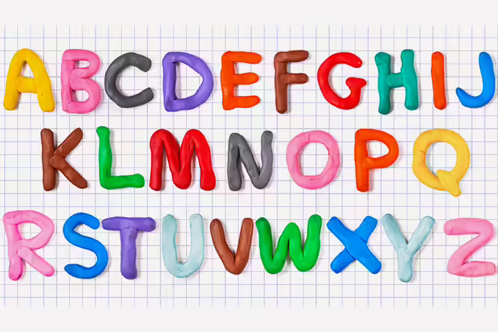 Using the playdough, kids have to make letters.