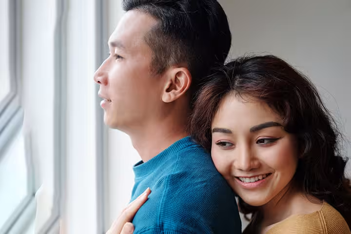 Woman hugging her husband