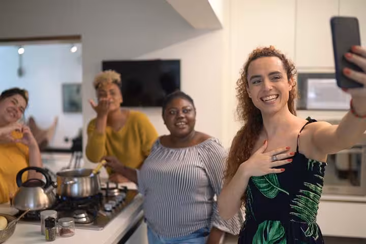 Women playing and recording at a bridal shower