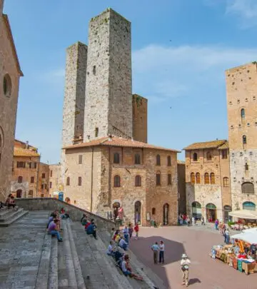 Discover hidden trattorias and sunlit tower views capturing centuries of Italian charm.