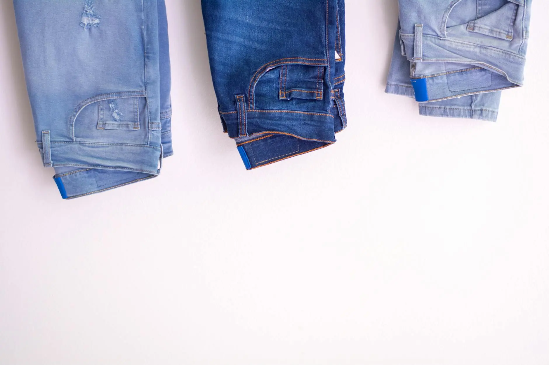 Mix contrasting washes and silhouettes for effortless, eye-catching outfits.